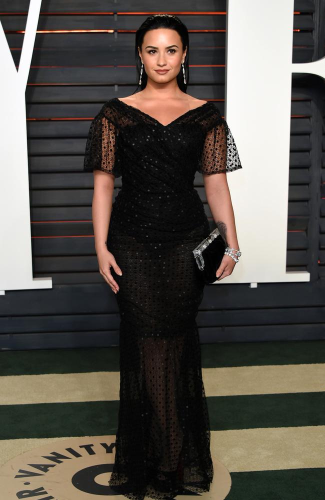 Demi Lovato arrives at the Vanity Fair Oscar Party on Sunday, Feb. 28, 2016, in Beverly Hills, Calif. (Photo by Evan Agostini/Invision/AP)