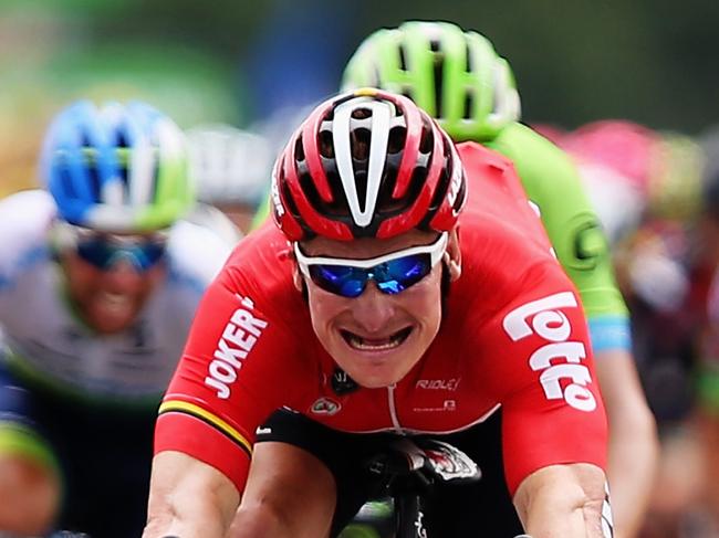 VALENCE, FRANCE - JULY 19: Andre Greipel (C) of Germany and Lotto-Soudal crosses the finish line to win Stage 15 of the Tour de France, a 183km rolling stage from Mende to Valence, on July 19, 2015 in Valence, France. (Photo by Bryn Lennon/Getty Images)