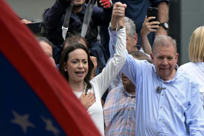 Venezuelan opposition leader Maria Corina Machado, pictured here with opposition presidential candidate Edmundo Gonzalez Urrutia, has called for nationwide protests over the vote result