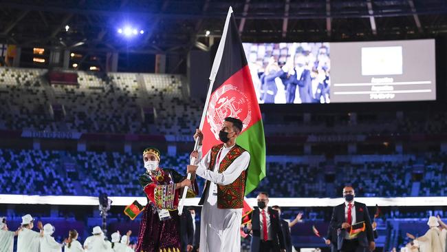 Opening Ceremony Tokyo Olympics: Flag bearers Kimia Yousofi and Farzad Mansouri of Team Afghanistan. Picture: Getty Images