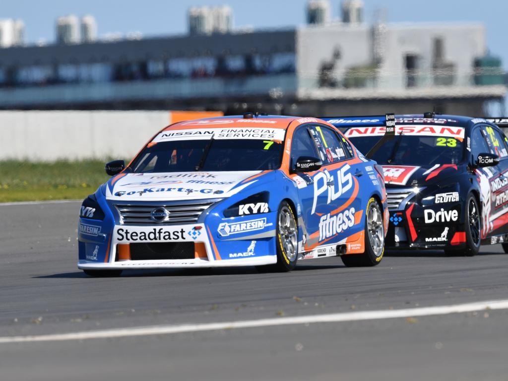 Andre Heimgartner of the Nissan Motor Sport team and Michael Caruso of the Nissan Motorsport team are seen during a qualifying session for Race 22 of the 2018 Virgin Australia Supercars Championship at the OTR SuperSprint at The Bend Motorsport Park. AAP Image/David Mariuz