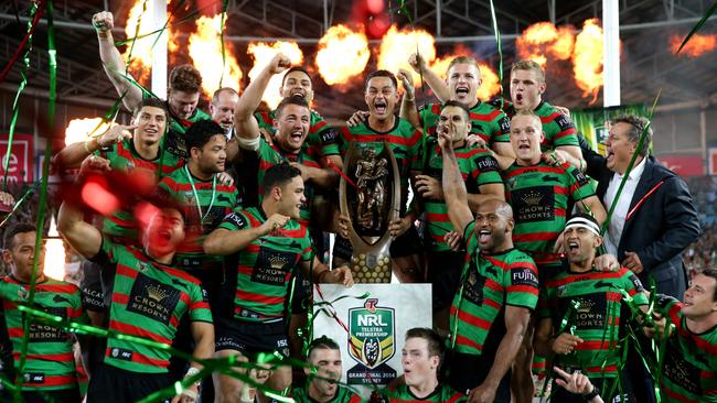 Clark, middle row second from right, celebrates winning the 2014 NRL Grand Final at ANZ Stadium. Picture Gregg Porteous