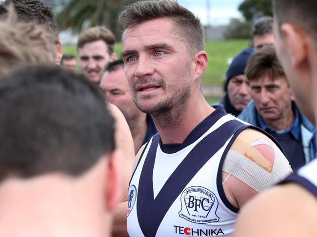 Ricky Dyson addresses his players during his time as coach at Bundoora.. Picture: Ian Currie