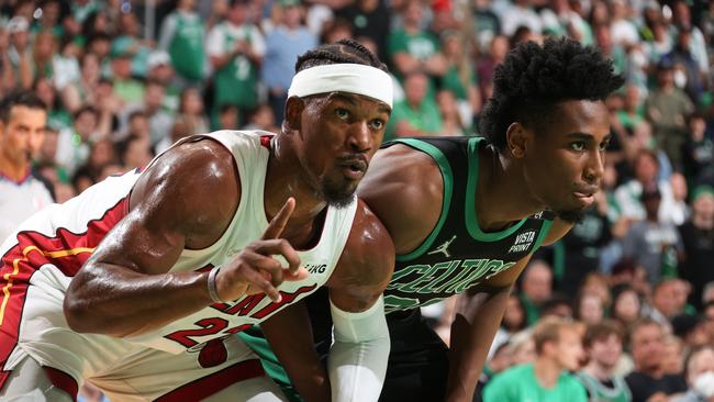 BOSTON, MA - MAY 27: Jimmy Butler #22 of the Miami Heat and Aaron Nesmith #26 of the Boston Celtics look on during Game 6 of the 2022 NBA Playoffs Eastern Conference Finals on May 27, 2022 at the TD Garden in Boston, Massachusetts. NOTE TO USER: User expressly acknowledges and agrees that, by downloading and or using this photograph, User is consenting to the terms and conditions of the Getty Images License Agreement. Mandatory Copyright Notice: Copyright 2022 NBAE (Photo by Nathaniel S. Butler/NBAE via Getty Images)