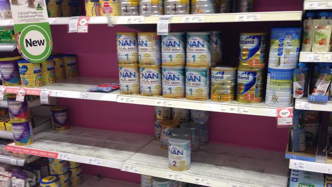 Low stocked shelves of baby formula product at Parkmore Coles in Keysborough.