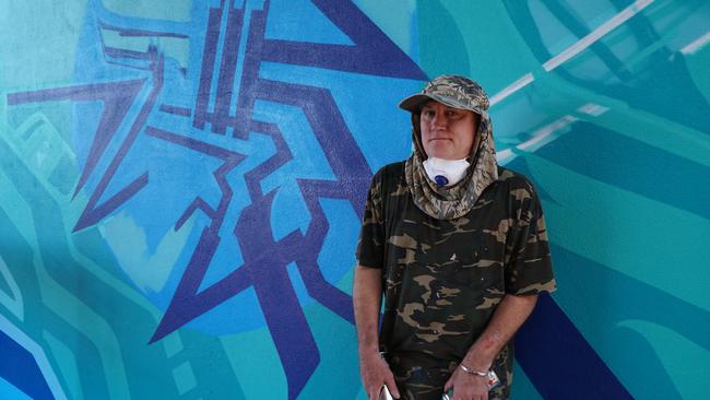 Street artist Scott Coleman, aka KAB101, on site at Commerce Place in Mount Gambier. Picture: Mount Gambier Council