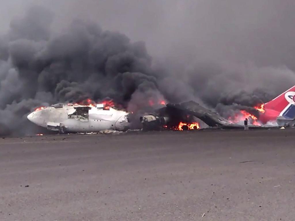 A burning aeroplane at Sanaa international airport after Israel's military warplanes struck Yemen's rebel-held capital Sanaa. Picture: AFP