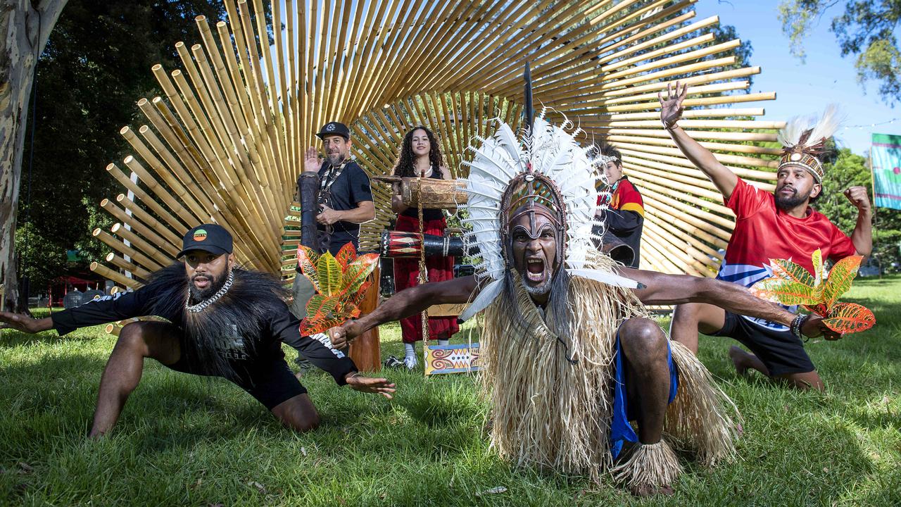 Sorong Samarai band members Sam Roem, Airileke Ingram, Mea Ingram, Albert David, Raga Ingram and Yosua Roem in front of the Tasku bamboo installation at Womadelaide in Botanic Park. Picture: Mark Brake