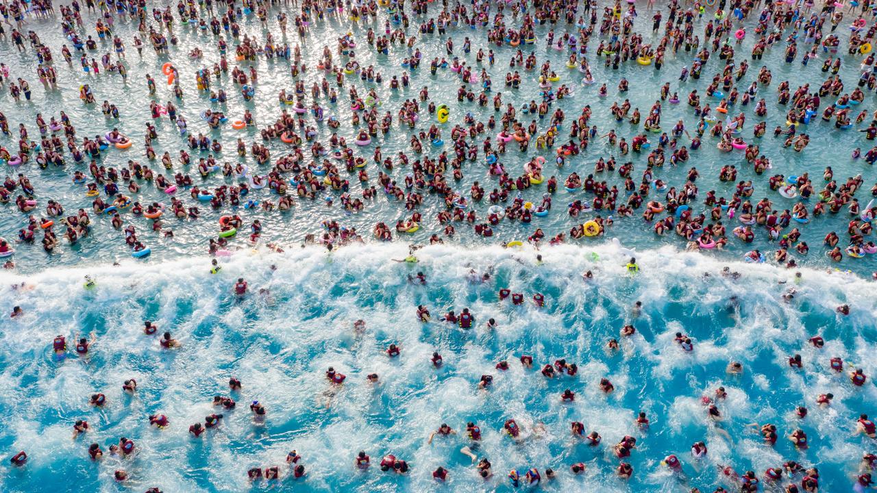 Aerial view of people cooling off at a water park on August 17, 2023 in Zhengzhou, Henan Province of China. Picture: Getty Images