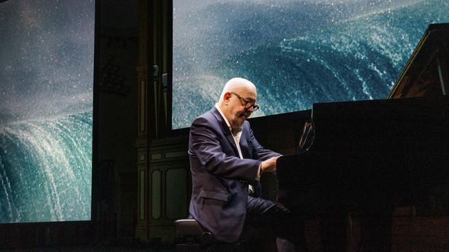 Adelaide Festival 2023. Paul Grabowsky performs with Alex Frayne's photography in Music for Other Worlds. Picture: Tony Lewis, supplied