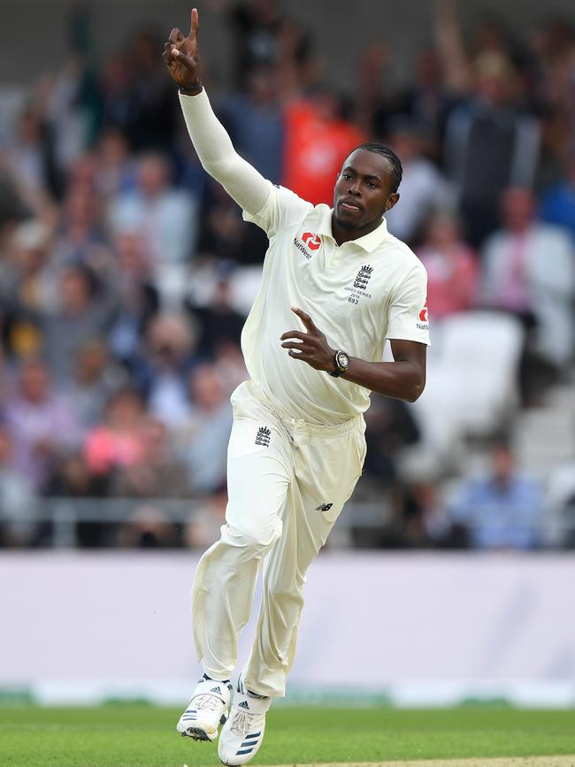 England bowler Jofra Archer celebrates after dismissing David Warner.