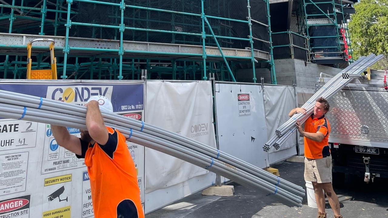 Workers at Condev's Kangaroo Point project on Monday. Photo: Glen Norris