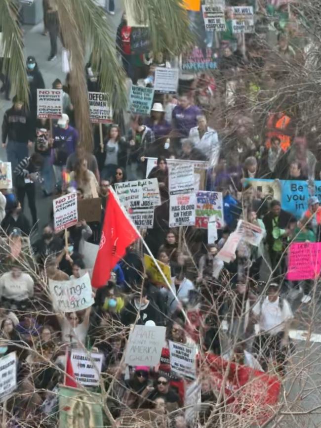 Hundreds of protesters march down Santana Row in San Jose, rallying against Donald Trump's immigration policies. Picture: Rob Locke