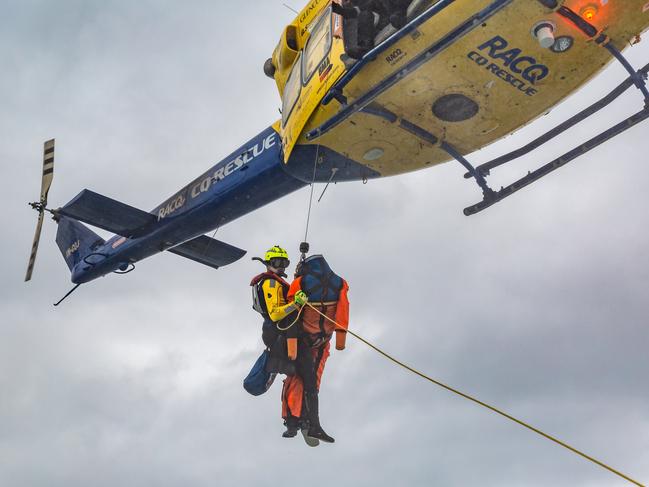 During the joint exercise with Volunteer Marine Rescue, RACQ CQ Rescue's Ben McCauley was winched out of their chopper and onto the VMR boat to retrieve a dummy.