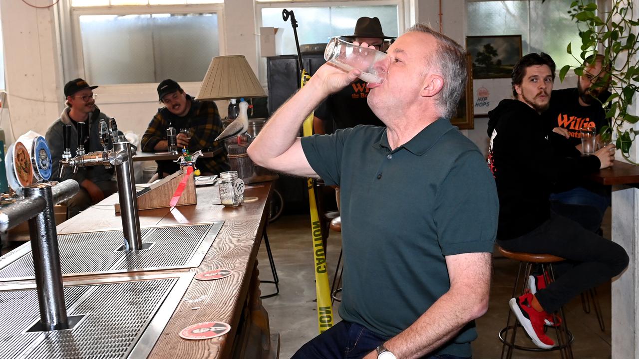 Hospitality businesses have rued the working-from-home culture. Here Anthony Albanese knocks one back at the Willie the Boatman Brewery in Sydney after the state came out of a lockdown in 2021. Picture: NewsWire / Jeremy Piper