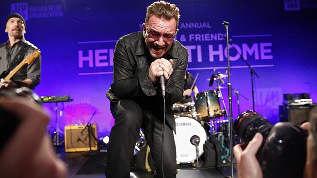 Bono performs on stage at the 3rd Annual Sean Penn & Friends HELP HAITI HOME Gala. (Photo by Colin Young-Wolff /Invision/AP)