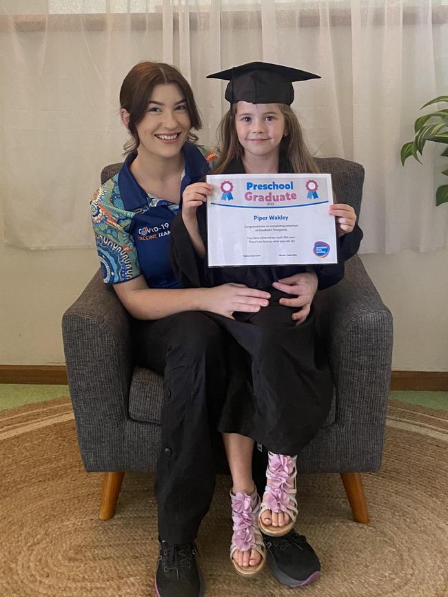 Piper with her mum Tayla on her graduation day.