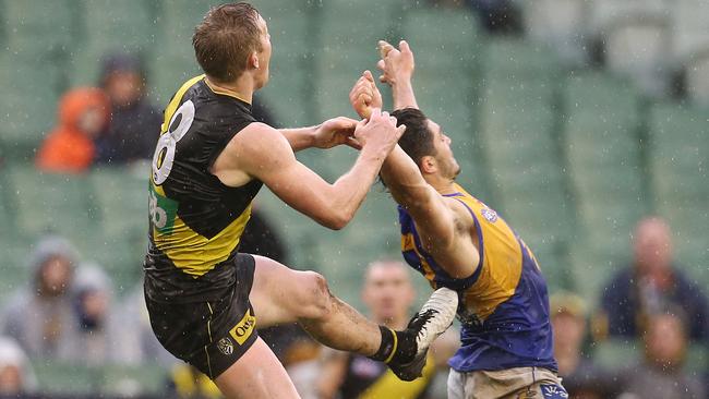 Riewoldt was penalised for this marking attempt. Picture: Michael Klein