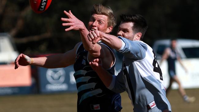 EFNL: Silvan’s Tyson Bissels battles with Dylan Hilton of Oakleigh District. Picture: Hamish Blair