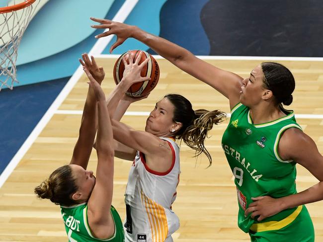 Spain's guard Marta Xargay (C) vies with Australia's guard Stephanie Talbot (L) and Australia's centre Liz Cambage. Picture: AFP