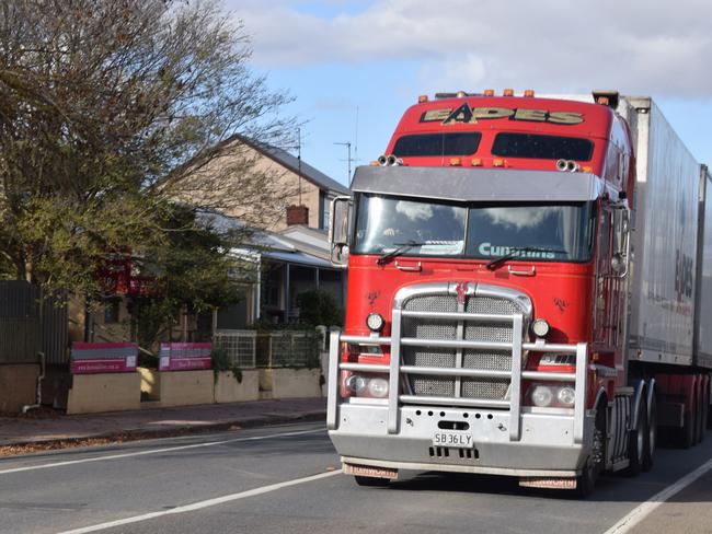 Wipe it off the map or save lives? Truck bypass ‘ripping town in half’