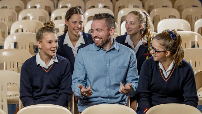 Sydney bullying expert Johnny Shannon speaking to parent and students at St Hildas School. Johnny with students (back l-r) Charlie Milligan, Grace Cowley, (front l-r) Tyeka Fergason-O'Shea and Rylee Boyde. Picture: Jerad Williams