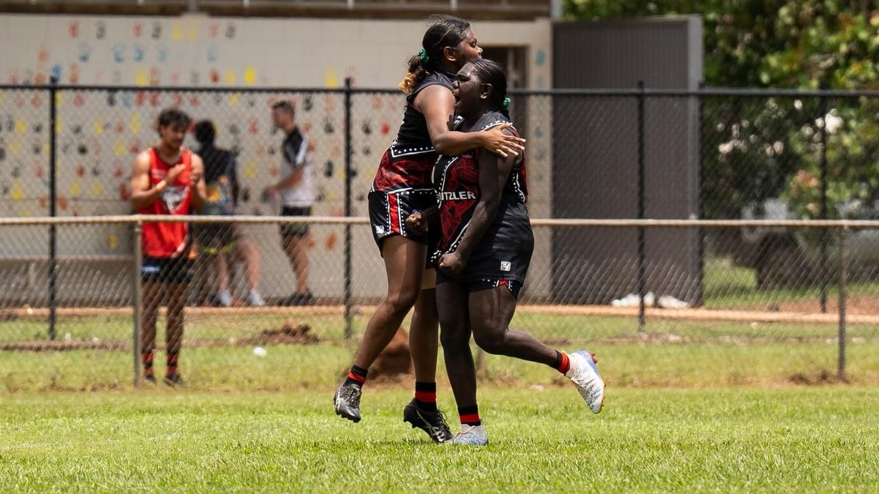 The Tiwi Bombers women celebrating in Round 9 of the 2024-25 NTFL season. Picture: Jack Riddiford / AFLNT Media