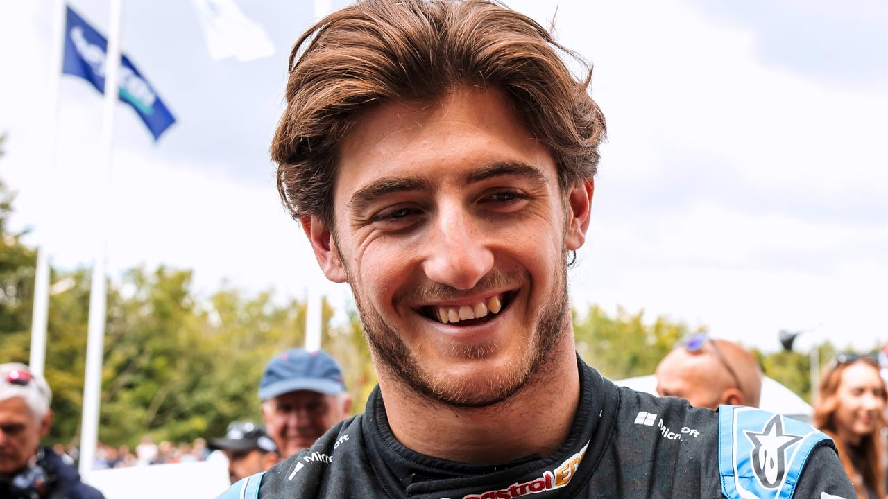 CHICHESTER, ENGLAND - JULY 13: Jack Doohan, reserve driver for Alpine F1 is interviewed with his dad Mick Doohan, former Grand Prix motorcycle racer during Day Three of the Goodwood Festival of Speed at Goodwood on July 13, 2024 in Chichester, England. (Photo by James Bearne/Getty Images)