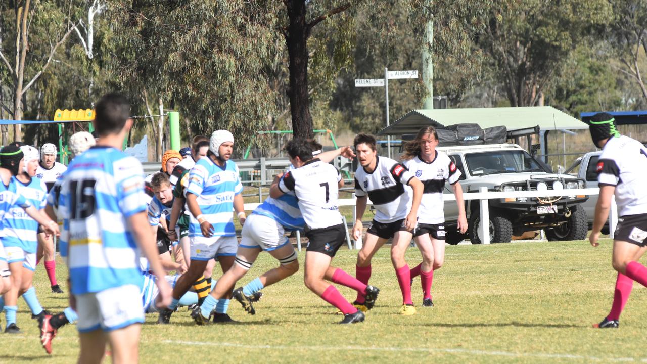 Jared Fearby (captain) with the ball for the men's B grade rugby union side.