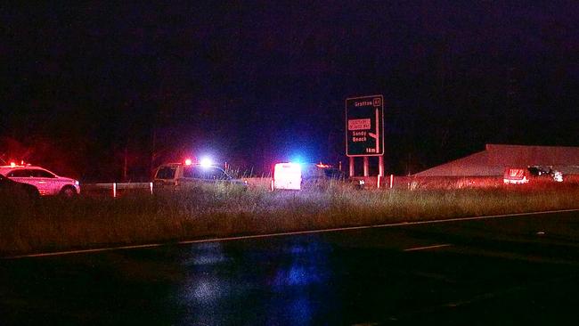 Police at the scene near Emerald Beach where a man was found in a car shot four times on Wednesday, April 7.