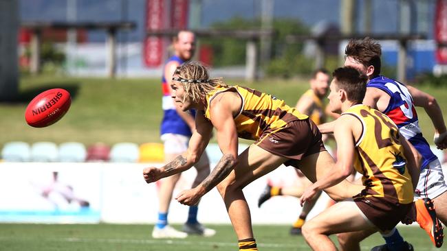 Former Hawk Chris Novy clears the ball in the AFL Cairns match between the Manunda Hawks and the Centrals Trinity Beach Bulldogs, held at Cazalys Stadium, Westcourt. PICTURE: BRENDAN RADKE.