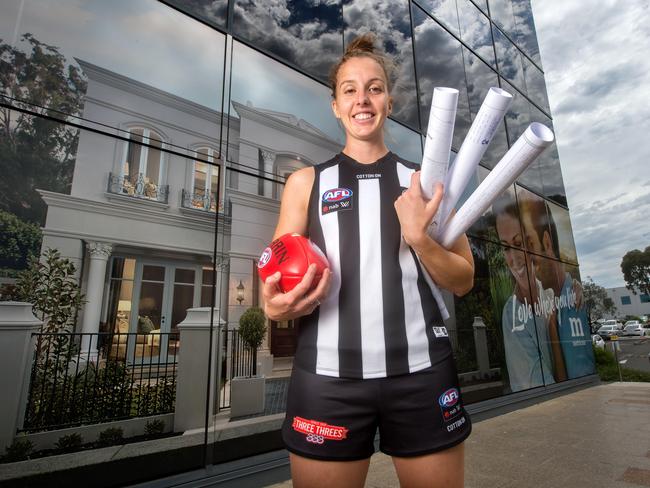 Collingwood WAFL player Emma King, at work at Metricon Homes where she is a draftsman. Picture: Jay Town