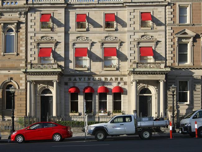 The old Savings Bank of Tasmania building in Murray St in full glory with all its red awnings, before the lower level awnings were removed.