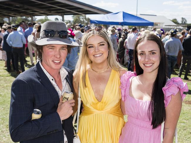 At the Clifton Races are (from left) Will Denny, Caitlin Fogarty and Emma Morris, Saturday, October 28, 2023. Picture: Kevin Farmer