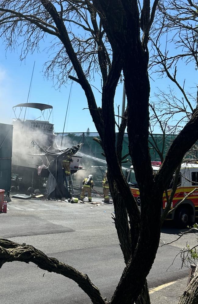 Firefighters battle a boat blaze on a dry dock in Buddina, on the Sunshine Coast. Picture: Contributed