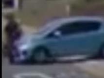 Still shot of CCTV on Hedges Ave shows a car hitting a cyclist in the bidirectional bike lane. Picture: Supplied