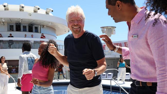 Virgin Group founder Richard Branson danced with a flash mob, on the Resilient Lady pool deck. Picture: NCA NewsWire/ Damian Shaw