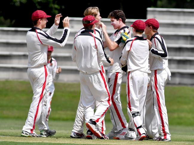 St Joseph's Gregory Terrace team mates celebrate a wicket by bowler Freddie Marshall.GPS First XI cricket match between home team St Joseph's Gregory Terrace and Brisbane Grammar School.Saturday March 13, 2021. Picture, John Gass