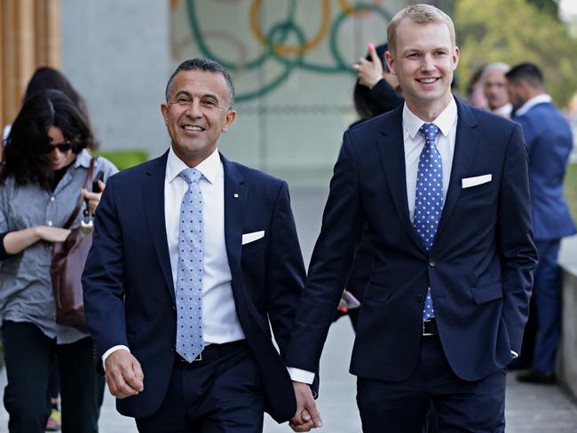 Michael Ebeid (left) and partner attending Alan Joyce and Shane Lloyd’s wedding. Picture: Adam Yip