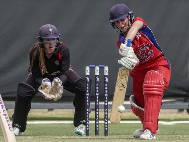 EMP keeper Tia Davidge and Melbourne batter Lucy Page. Picture: Valeriu Campan