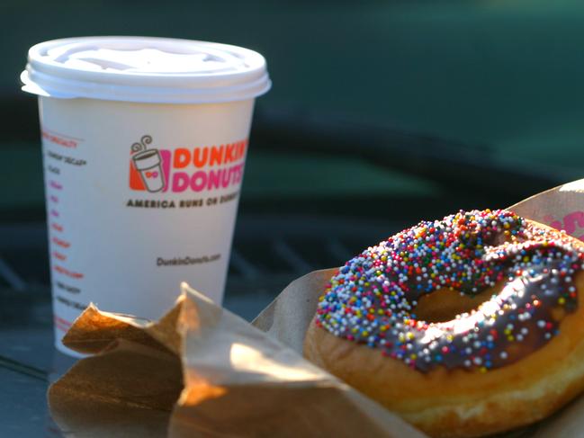 Brooklyn, New York, USA - April 12, 2014: A Dunkin Donuts coffee and doughnut.