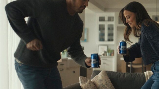 A Bud Light 2023 Super Bowl ad featured actor Miles Teller and his wife, Keleigh Sperry Teller, having an impromptu dance party in their living room. Picture: Bud Light/ AP