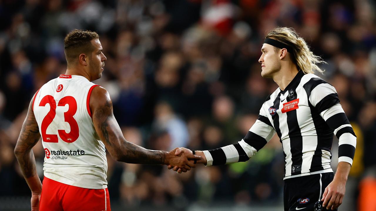 Lance Franklin (left) of the Swans and Darcy Moore of the Magpies shake hands after the match at the MCG. (Photo by Dylan Burns/AFL Photos via Getty Images)