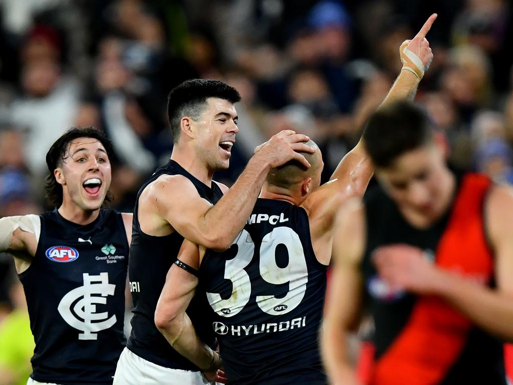 Alex Cincotta celebrates a goal with Matt Kennedy and Oliver Hollands. Picture: Josh Chadwick/Getty Images