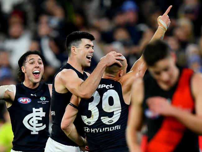 Alex Cincotta celebrates a goal with Matt Kennedy and Oliver Hollands. Picture: Josh Chadwick/Getty Images