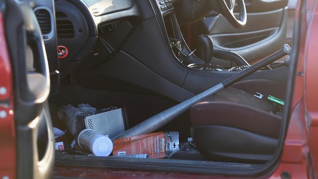 A baseball sits in the smashed car the offenders then hijacked a man's car and fled the scene. Truck vs car Western Ring Road Laverton North. Picture: Nicole Garmston