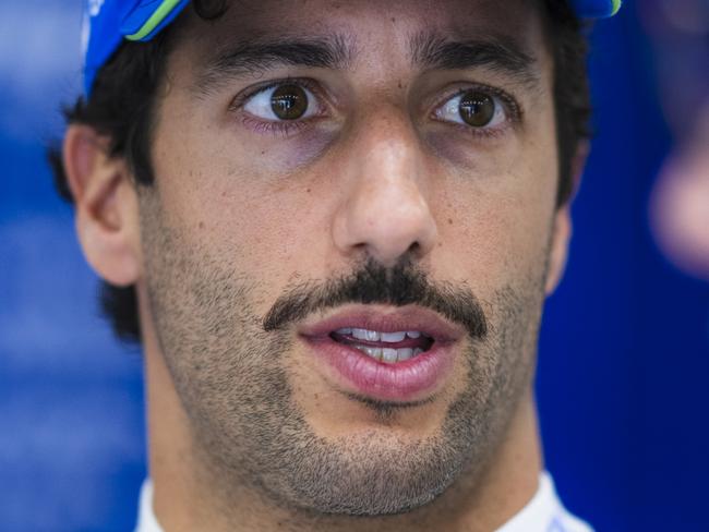 SPA, BELGIUM - JULY 25: Daniel Ricciardo of Australia and Visa Cash App RB looks on in the garage during previews ahead of the F1 Grand Prix of Belgium at Circuit de Spa-Francorchamps on July 25, 2024 in Spa, Belgium. (Photo by Rudy Carezzevoli/Getty Images)