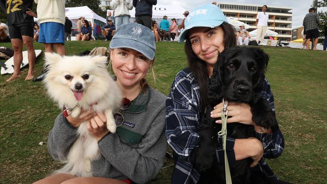 Jemma Reborn with Chico and Katie McDonald with Neo at the Surf of Origin at Burleigh Beach. Picture: Annette Dew