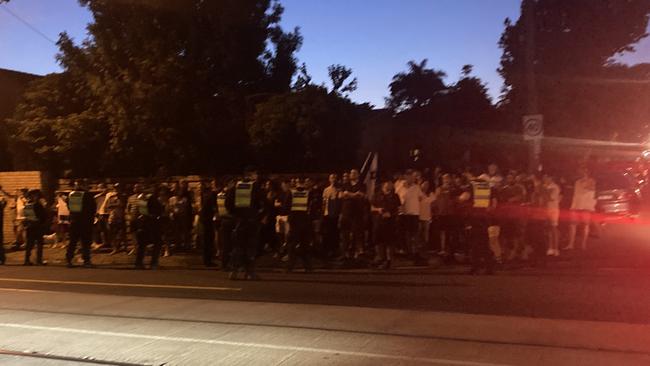 Protesters outside the Caulfield South synagogue.