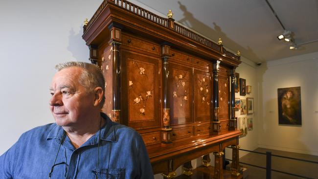 Geoff Hannah and the iconic cabinet.